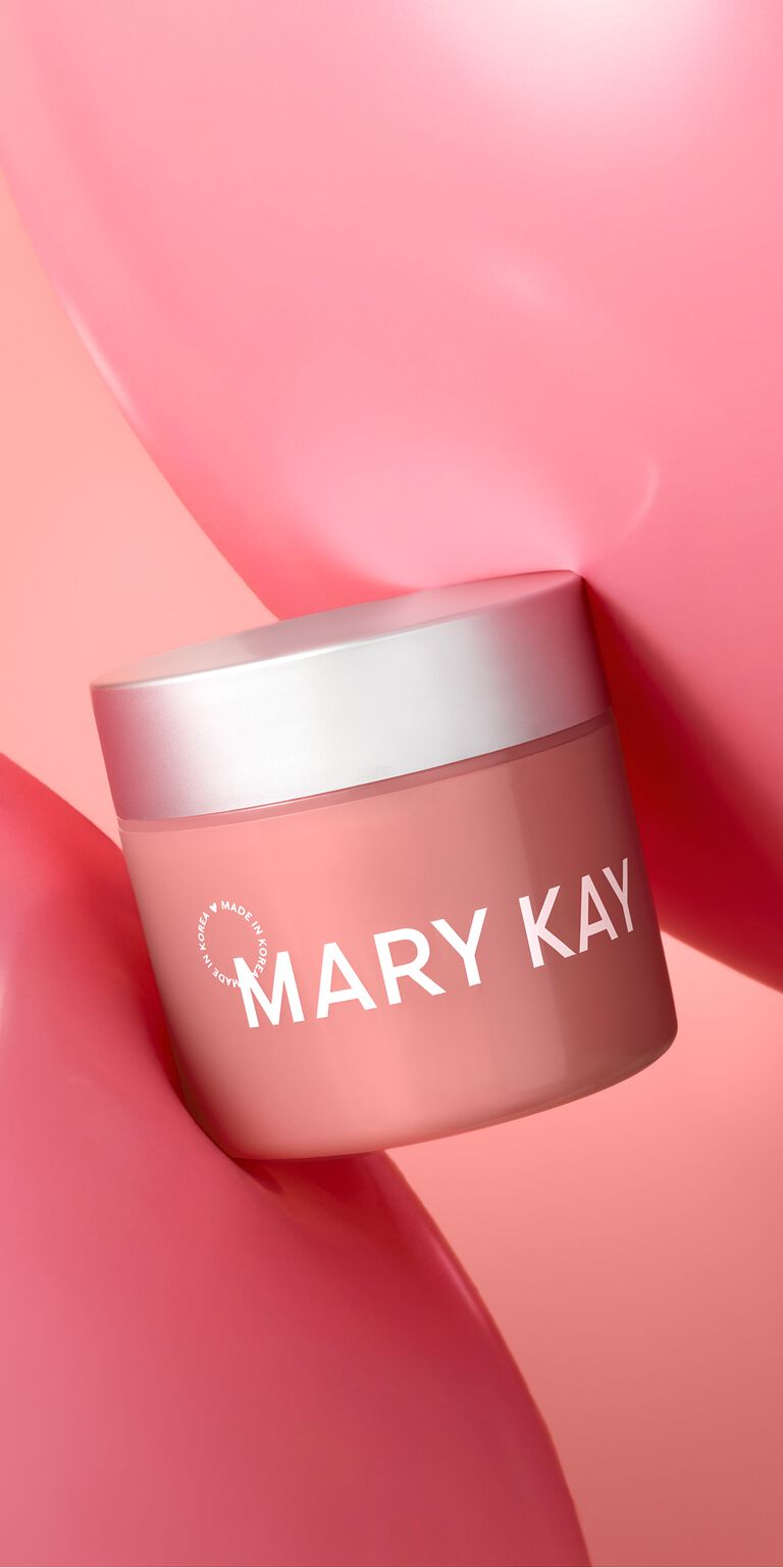 Frasco de Gel Humectante con Col&aacute;geno Mary Kay&reg; de Edici&oacute;n Especial entre dos globos rosas