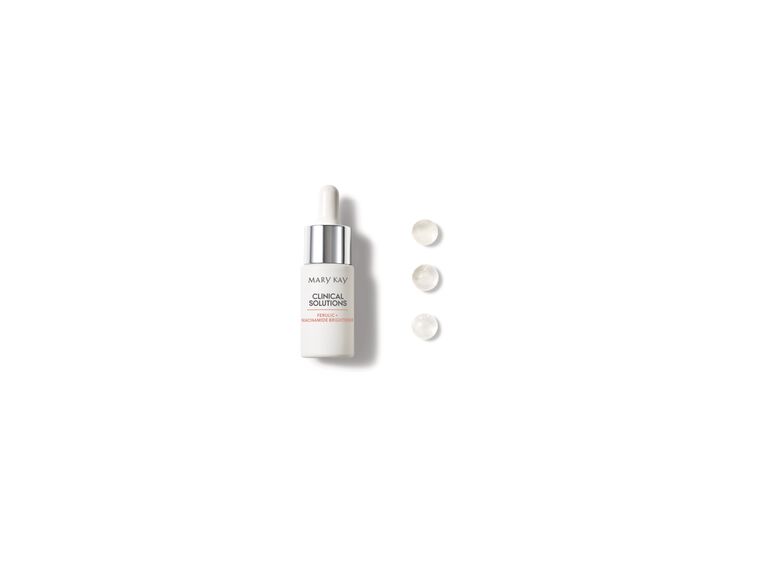 Frasco del Concentrado Iluminador de &Aacute;cido Fer&uacute;lico + Niacinamida Mary Kay Clinical Solutions&reg; con gotas a un lado.