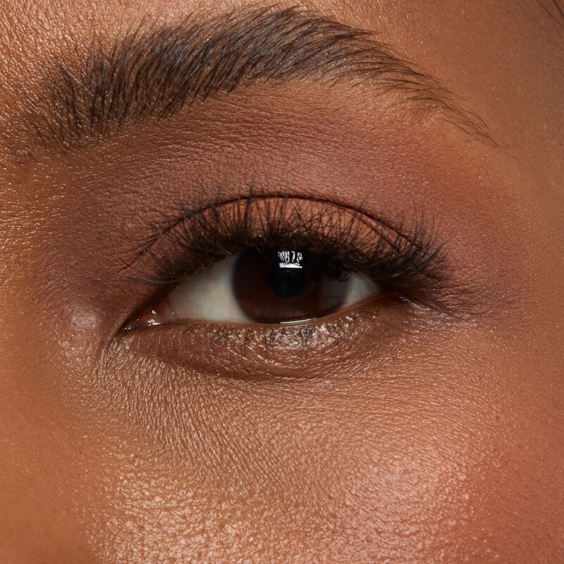 Macro eye shot&nbsp;of Mary Kay&reg;&nbsp;MatteEye&nbsp;Shadow Stick in&nbsp;Orbit Clay&nbsp;on&nbsp;deep&nbsp;skin&nbsp;tone.