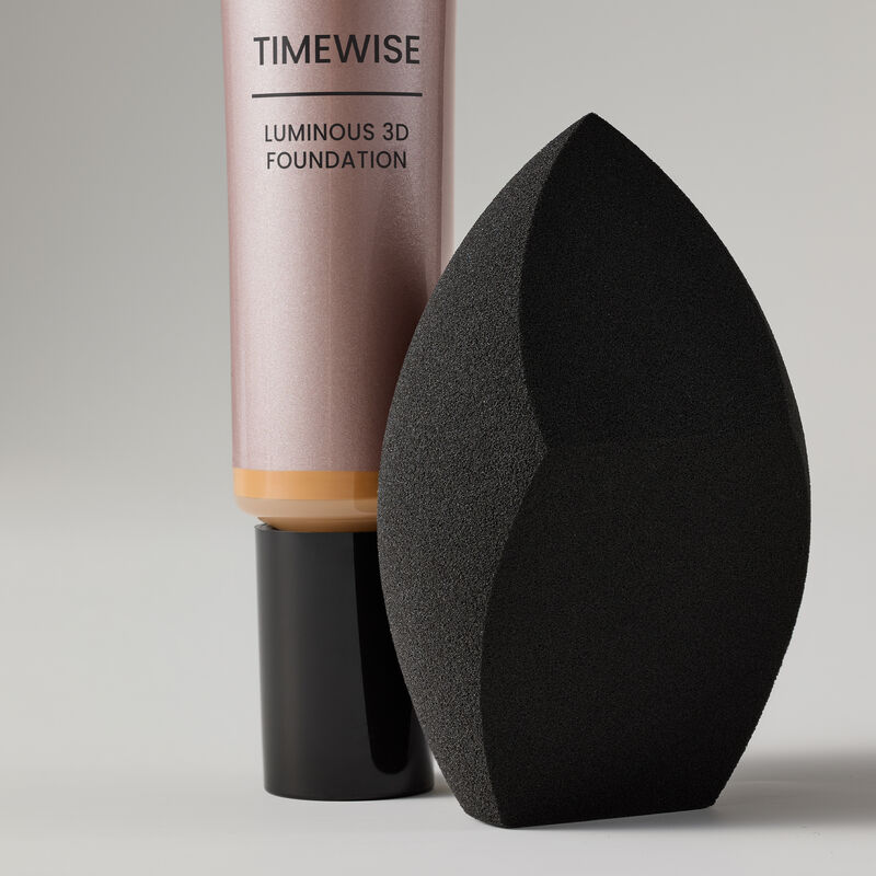 Mary Kay Complexion Sponge placed next to TimeWise Luminous 3D Foundation
