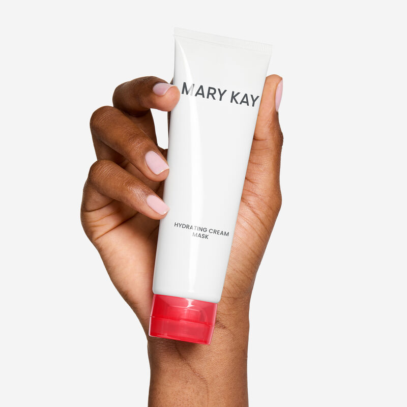 Mary Kay Hydrating Cream Mask being held by a woman&rsquo;s hand.