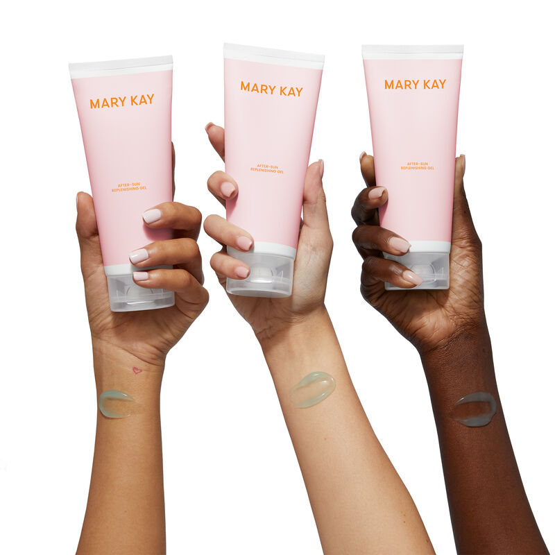 Medium, light, and deep skin tones arms, each with blue gel smear near wrist and holding up a bottle of Mary Kay&reg; After-Sun Replenishing Gel