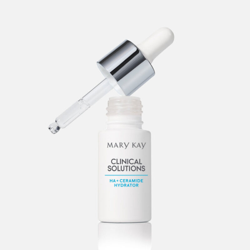 Open bottle of Mary Kay Clinical Solutions&trade; HA + Ceramide Hydrator with filled dropper