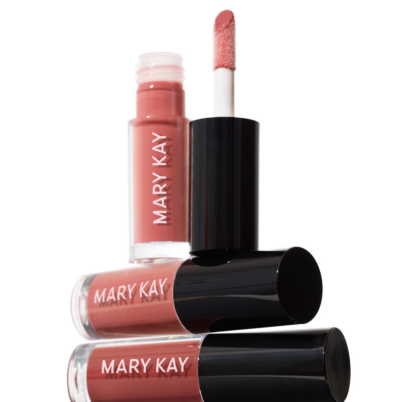 Horizontal stack of Mary Kay Tinted Lip Oil in Blush and Berry with an additional vertical uncapped tube of Mary Kay Tinted Lip Oil in Blushnbsp