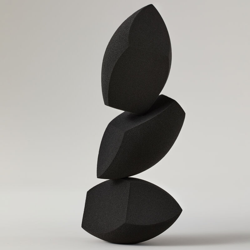 Three Mary Kay Complexion Sponges stacked on top of one another