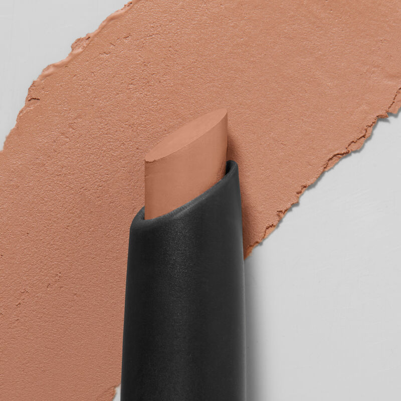 Mary Kay MattenbspEye Shadow Stick innbspCelestial Nude slanted tip in foreground swatch in backgroundnbsp