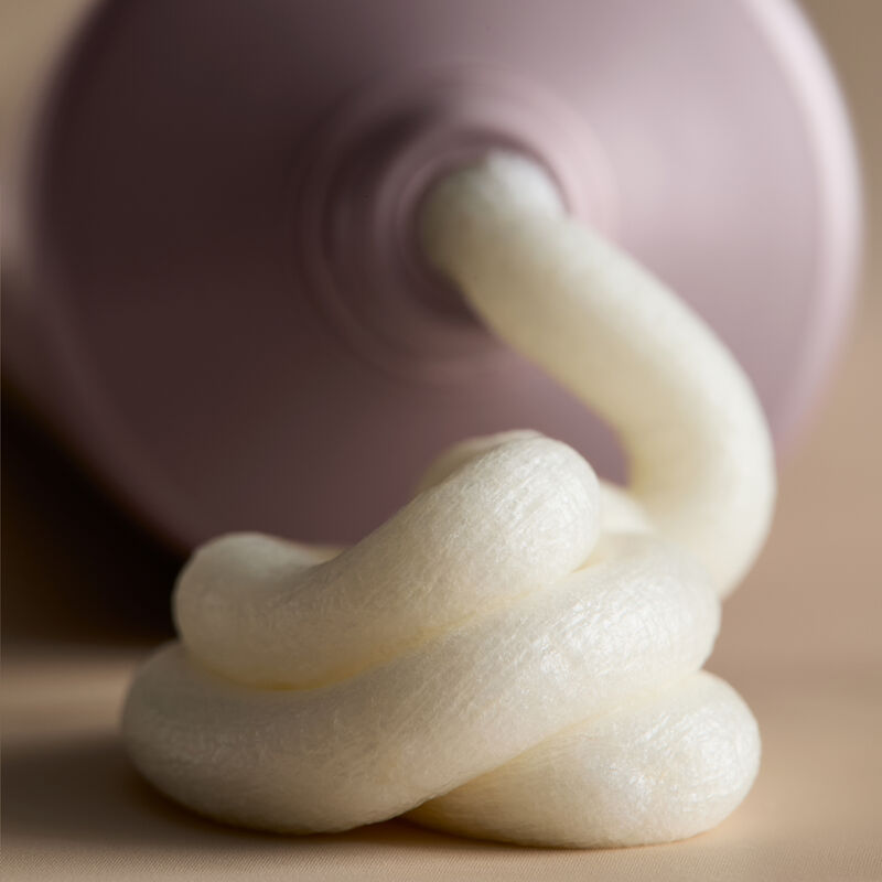 Closeup of cleanser coming out of tube