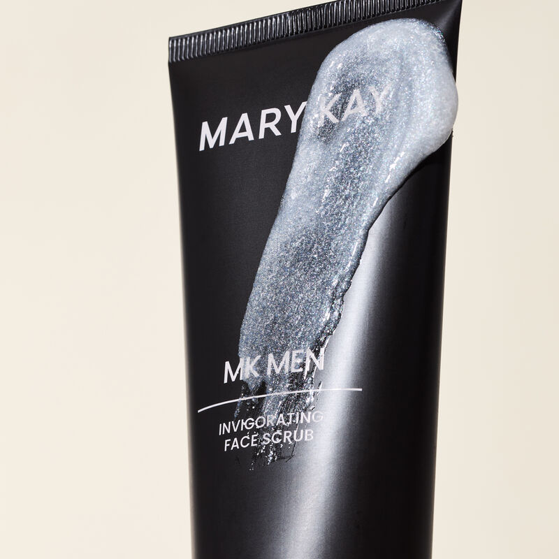 Limited-edition MKMen Invigorating Face Scrub tube with swipe of product across, showcasing the formula and texture.&nbsp;&nbsp;