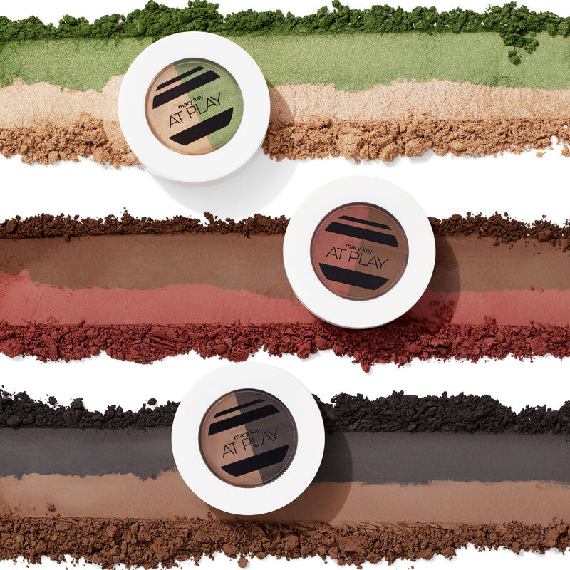 Horizontal product rubs of special-edition Mary Kay At Play Eye Shadow Duos in all three shade combinations beneath corresponding compacts image number null
