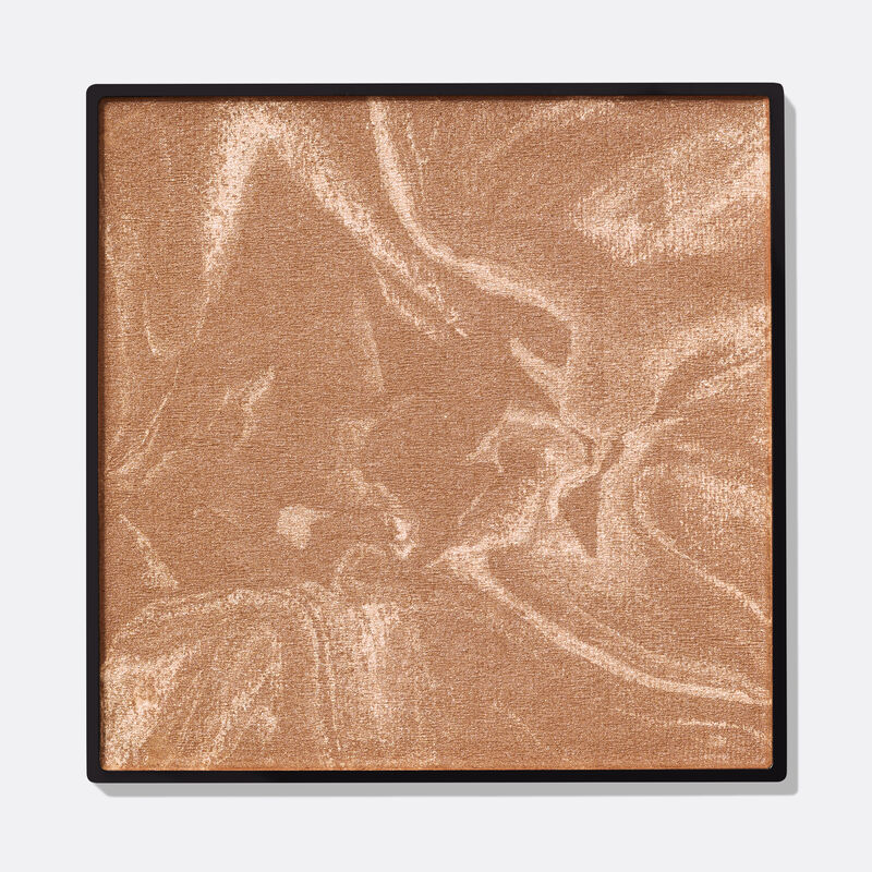 Limited-edition Mary Kay Illuminating Bronzer in shade Medium Glow against plain background