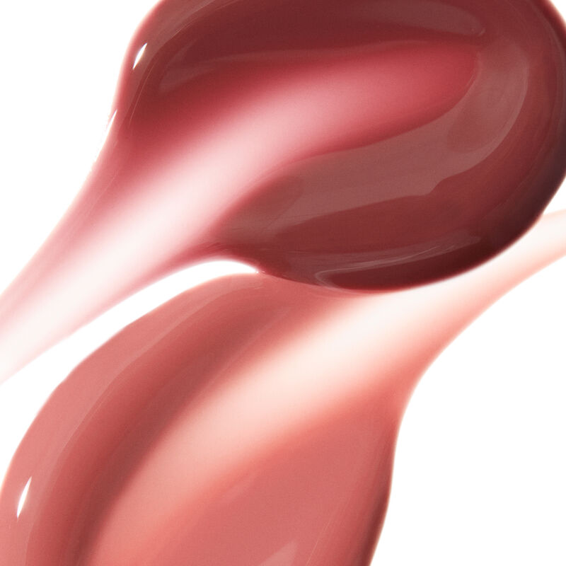 Mary Kay Tinted Lip Oil swipes in Berry and Blush on white backgroundnbsp