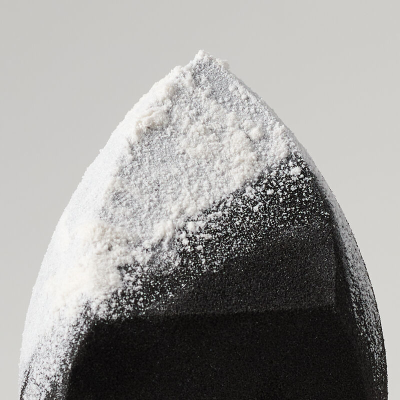 Mary Kay Complexion Sponge with powder product on surface