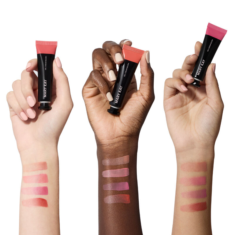 Swatches of all four shades of limited-edition Mary Kay Gel Cream Blush on light, deep and medium skin-toned arms against white background with Pink S